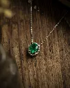 the-jewellers-guild-oval-emerald-and-diamond-halo-necklace-38262891905268_1728x.webp